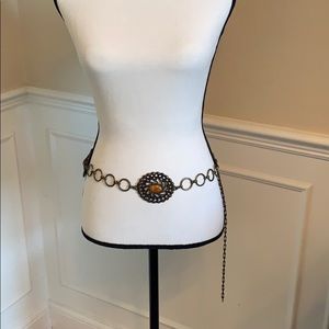 Belt with metal and brown stones.